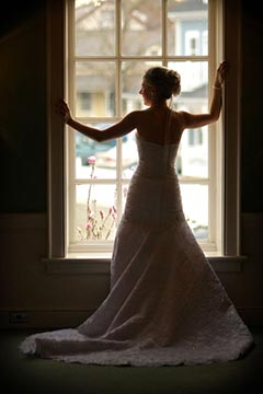 Toronto Wedding Photographer - Bride posing near window