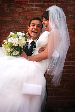 Toronto Wedding Photo - Groom carrying the Bride